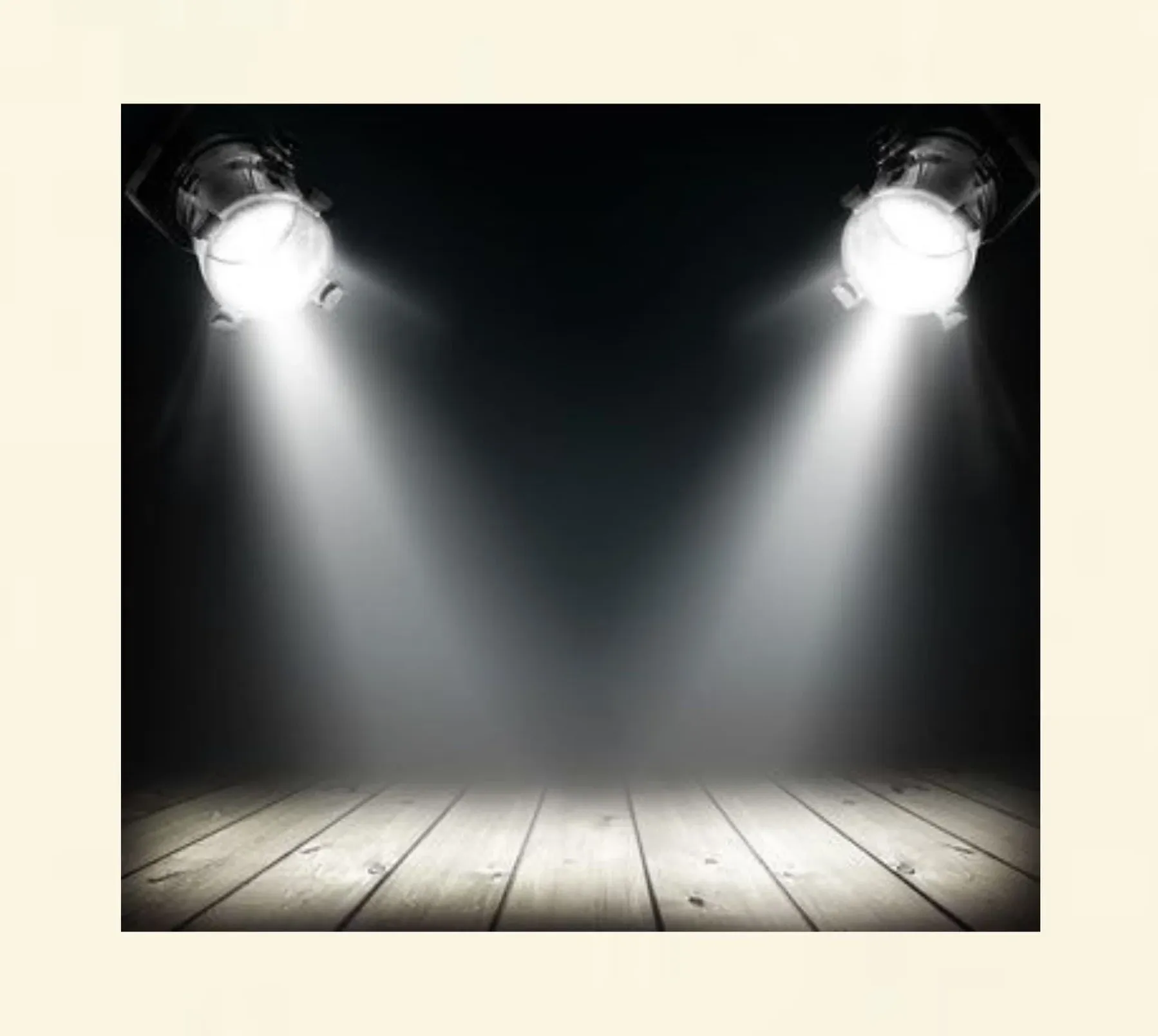 Symbolbild mit Scheinwerfern zur Darstellung der Bühnenhypnose