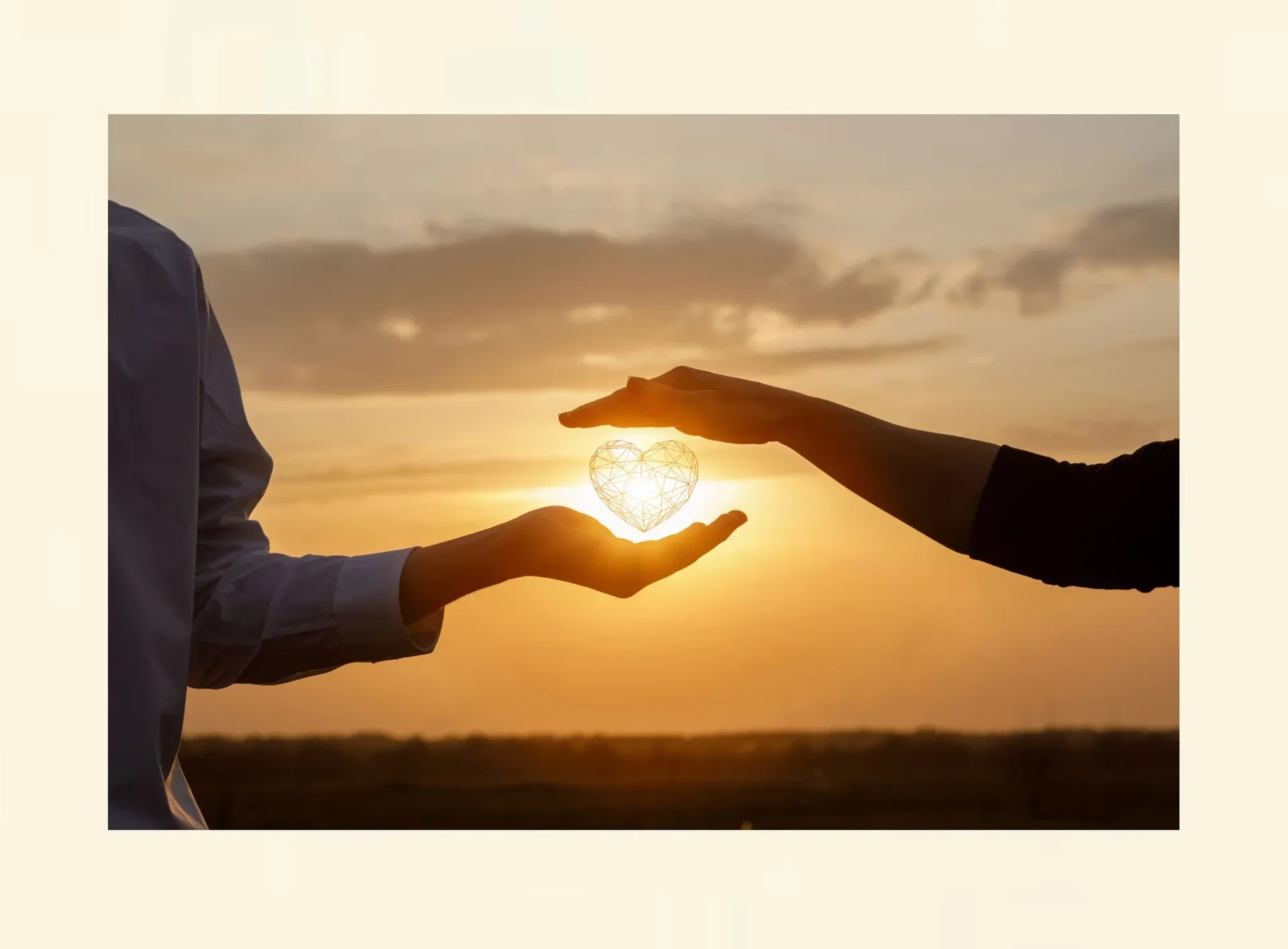 Zwei Menschen mit einem Herz zwischen ihnen als Symbol für früh entstandene Bindungsmuster in Beziehungen